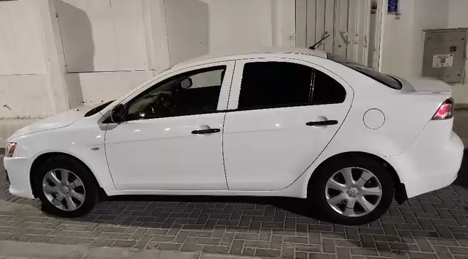 مستعملة Mitsubishi Lancer للبيع في الدوحة #5327 - 1  صورة 